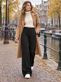 Thermo pantalon dames zwart, wijde pijp, gedragen met crème coltrui